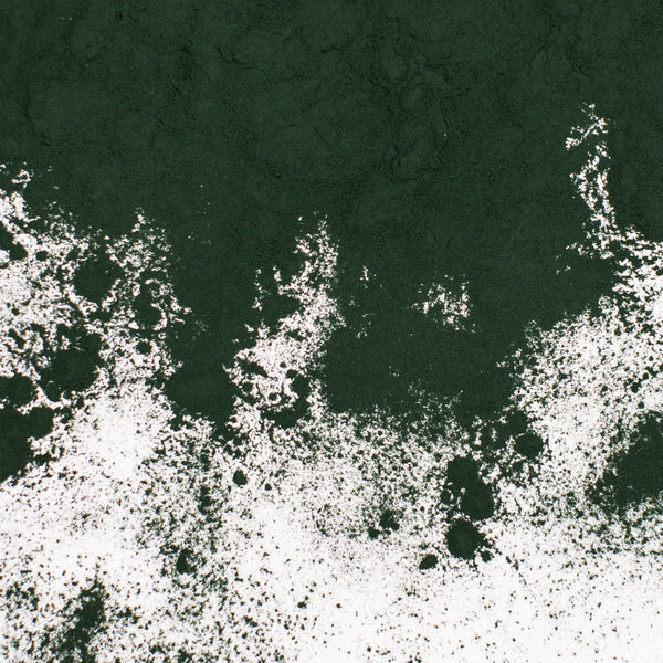 Polvo fino de color verde.