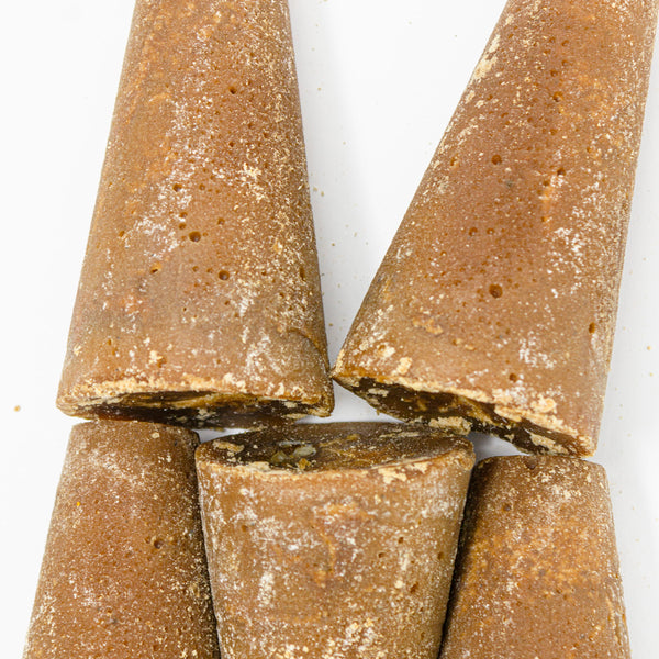 Tapón de color marrón de 15 a 20 cms de altura.