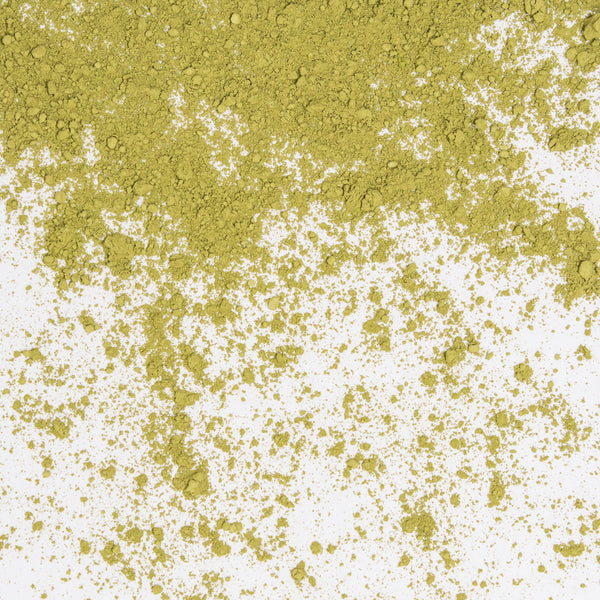 Polvo fino de color verde vibrante.